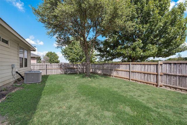 view of yard featuring central AC unit