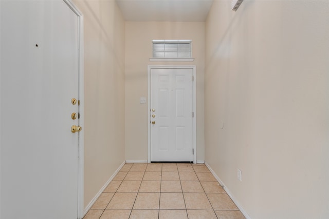 entryway featuring light tile patterned flooring