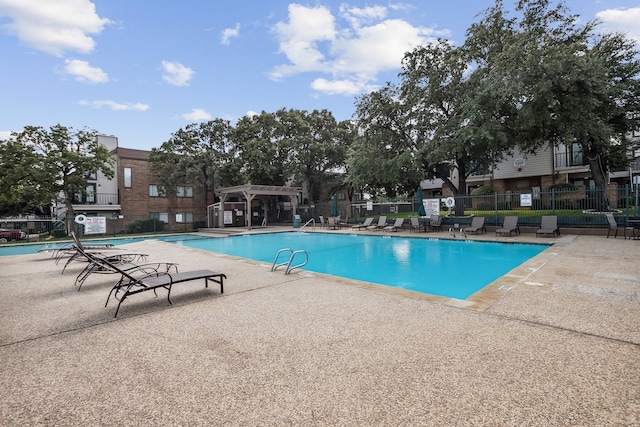 view of pool featuring a patio area