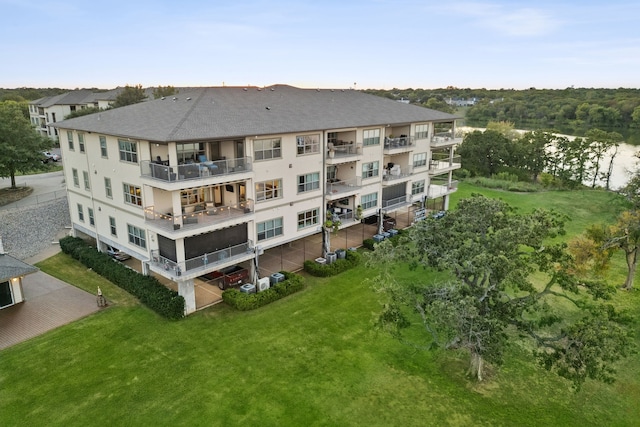 view of building exterior featuring a water view