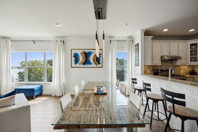 dining space featuring light wood-type flooring