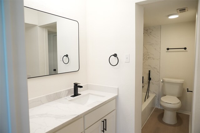 full bathroom with vanity, toilet, and shower / bathtub combination