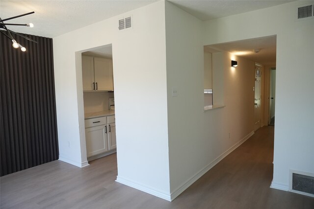 hall featuring light wood-type flooring