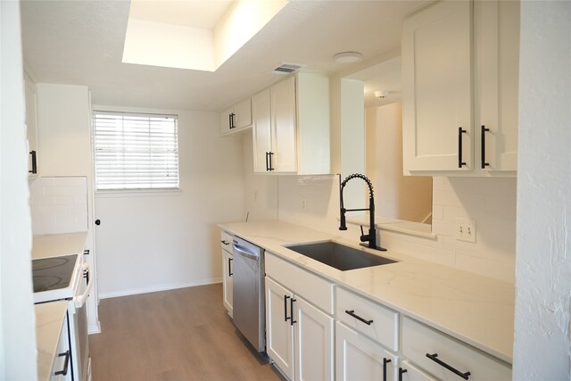 kitchen with white cabinets, light hardwood / wood-style floors, sink, white range with electric stovetop, and stainless steel dishwasher