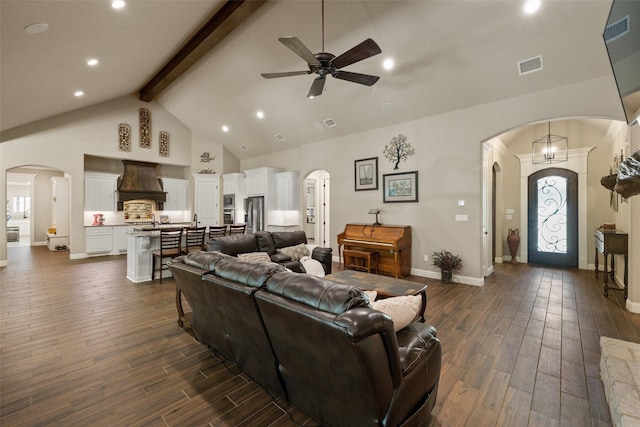 living room featuring beamed ceiling, ceiling fan, dark hardwood / wood-style flooring, and high vaulted ceiling