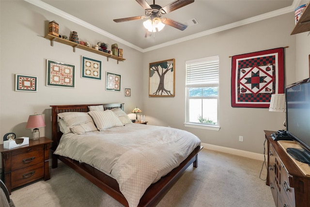 bedroom with baseboards, visible vents, light colored carpet, and crown molding