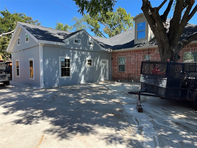 view of front of property featuring a patio