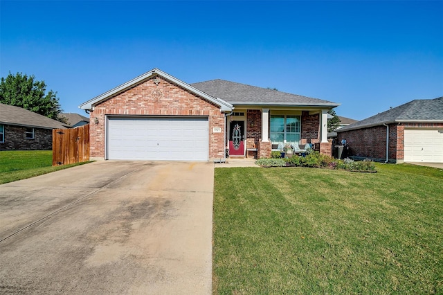 ranch-style house with a garage and a front yard