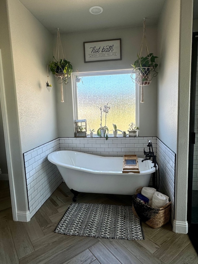 bathroom with a washtub