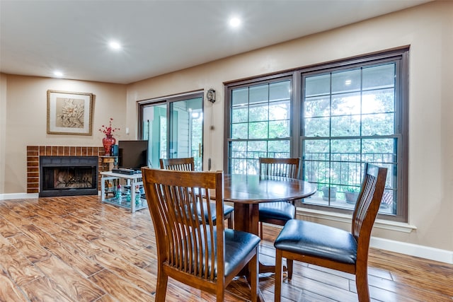 dining area featuring hardwood / wood-style floors and a wealth of natural light