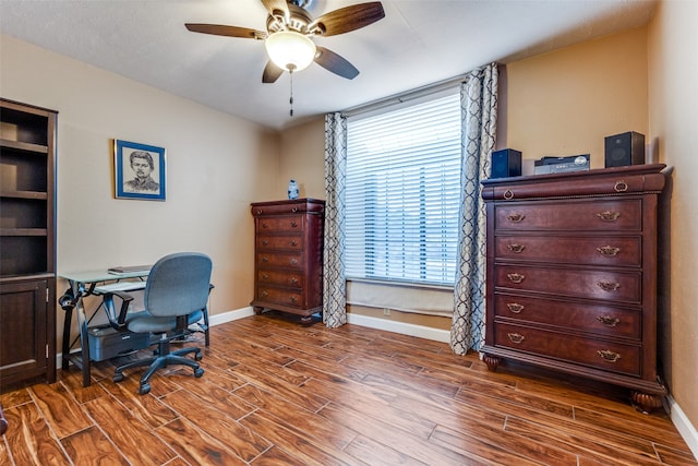 office with ceiling fan and dark hardwood / wood-style floors