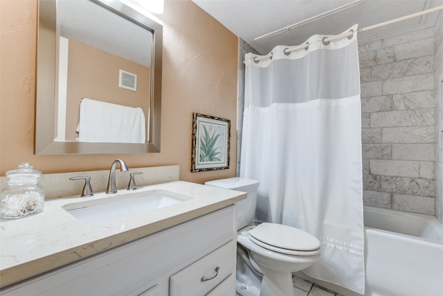 full bathroom featuring shower / bath combo with shower curtain, vanity, and toilet