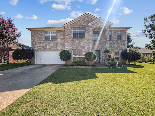 front facade featuring a front yard and a garage