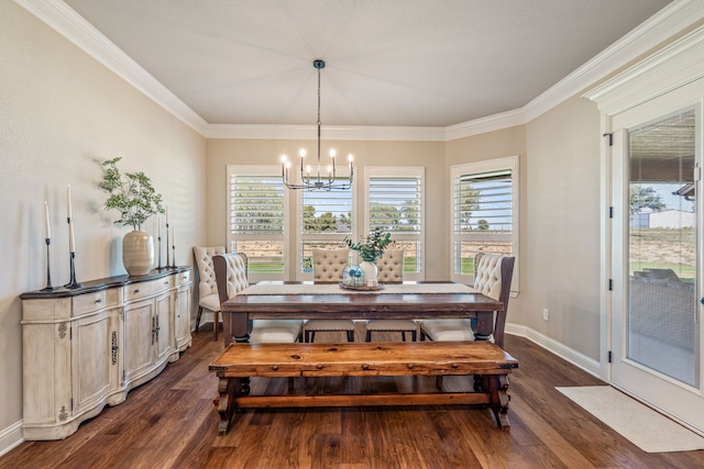 dining space with crown molding, dark hardwood / wood-style flooring, and a chandelier