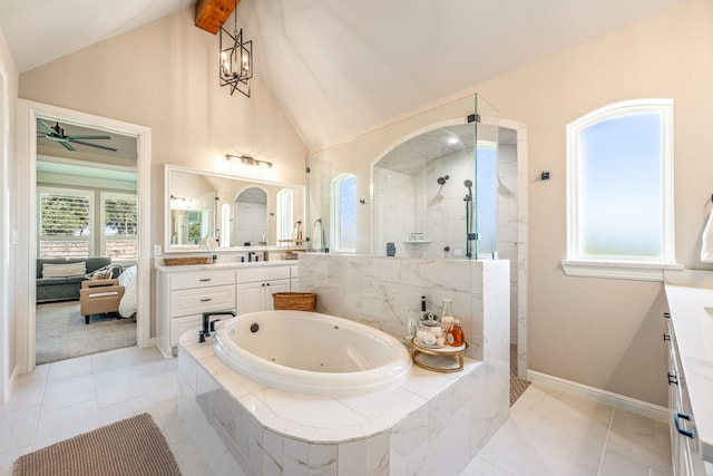 bathroom with high vaulted ceiling, plus walk in shower, tile patterned floors, vanity, and ceiling fan