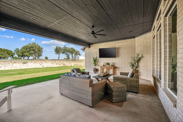 view of patio with ceiling fan and an outdoor hangout area