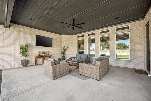 view of patio featuring ceiling fan and outdoor lounge area