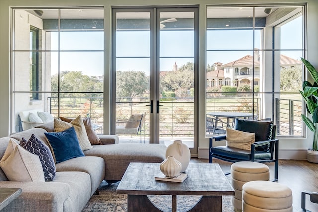 doorway to outside with hardwood / wood-style flooring and plenty of natural light