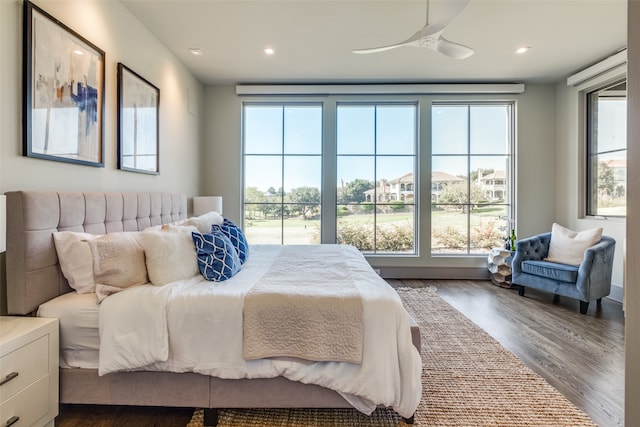 bedroom featuring wood-type flooring and ceiling fan