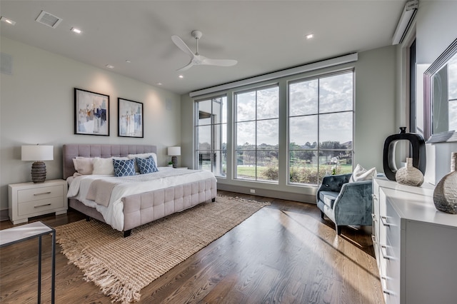 bedroom featuring ceiling fan and hardwood / wood-style flooring