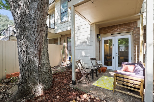 exterior space featuring french doors and a balcony