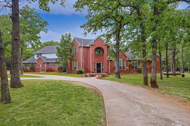 view of front of home with a front lawn