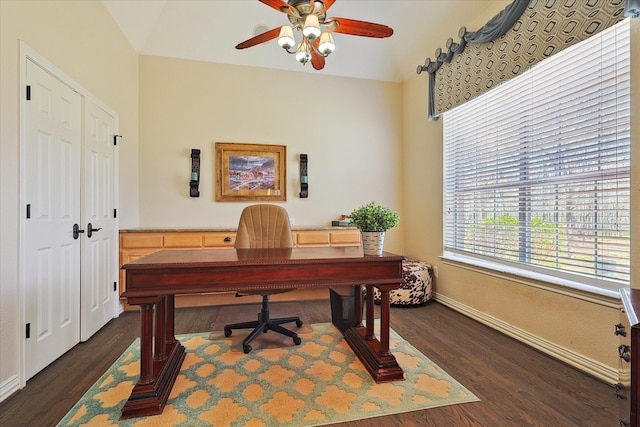 office area with dark wood-type flooring and ceiling fan