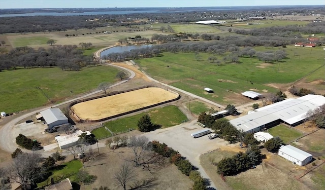 drone / aerial view with a rural view and a water view