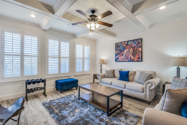 living room with crown molding, ceiling fan, coffered ceiling, and light hardwood / wood-style floors