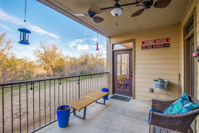 balcony featuring ceiling fan