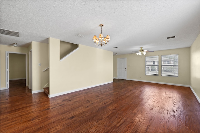 unfurnished living room with a textured ceiling, ceiling fan with notable chandelier, and dark hardwood / wood-style flooring