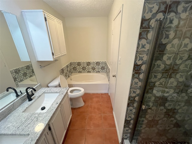 full bathroom with vanity, a textured ceiling, plus walk in shower, tile patterned floors, and toilet