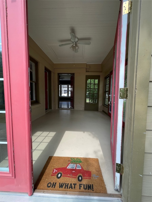 interior space featuring ceiling fan