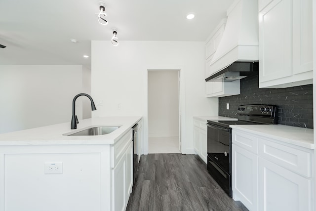 kitchen with black range with electric cooktop, dark hardwood / wood-style flooring, sink, and white cabinets