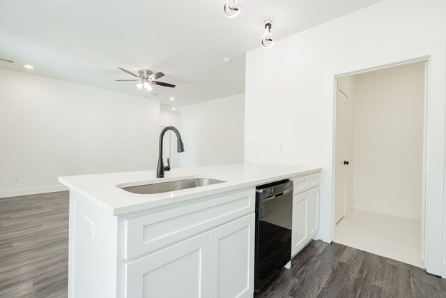 kitchen featuring dark hardwood / wood-style flooring, dishwasher, sink, white cabinetry, and ceiling fan