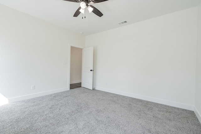 unfurnished room featuring carpet and ceiling fan