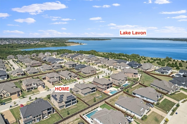 bird's eye view featuring a residential view and a water view