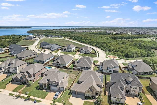 aerial view featuring a water view and a residential view