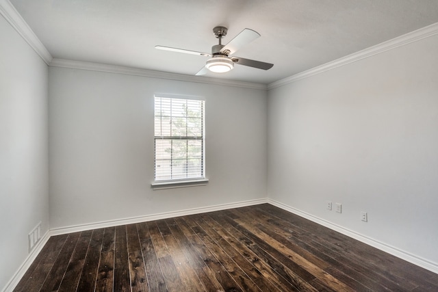 empty room with ceiling fan, dark hardwood / wood-style flooring, and ornamental molding