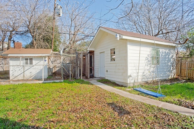 exterior space featuring a yard and a shed