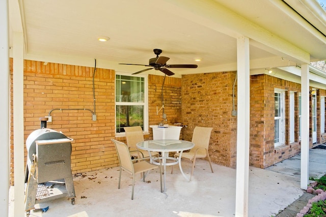 view of patio / terrace featuring ceiling fan