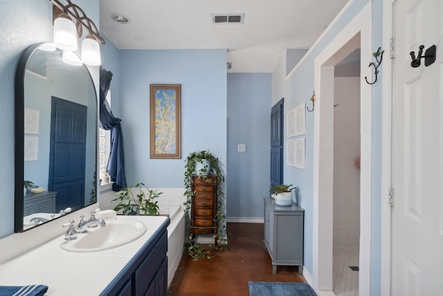 bathroom with vanity, a shower, and concrete flooring