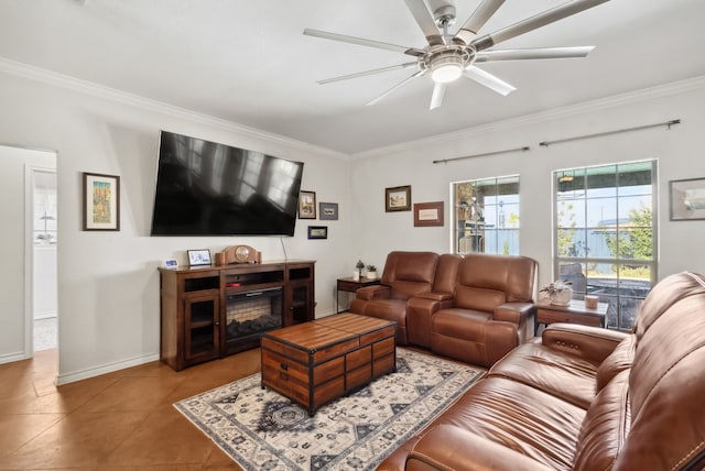 tiled living room featuring ceiling fan and ornamental molding