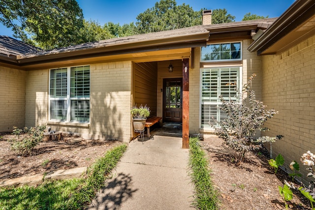 doorway to property featuring a patio area