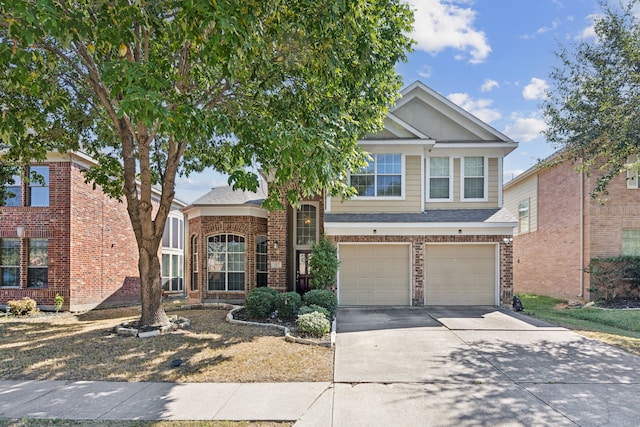 view of front of property featuring a garage