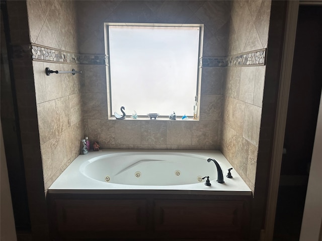 bathroom featuring a tub to relax in