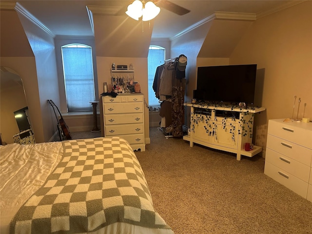 carpeted bedroom featuring ceiling fan and ornamental molding