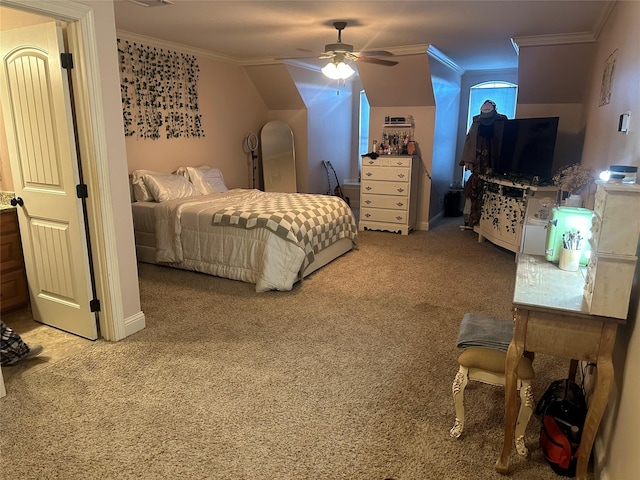 bedroom with ceiling fan, carpet, and crown molding