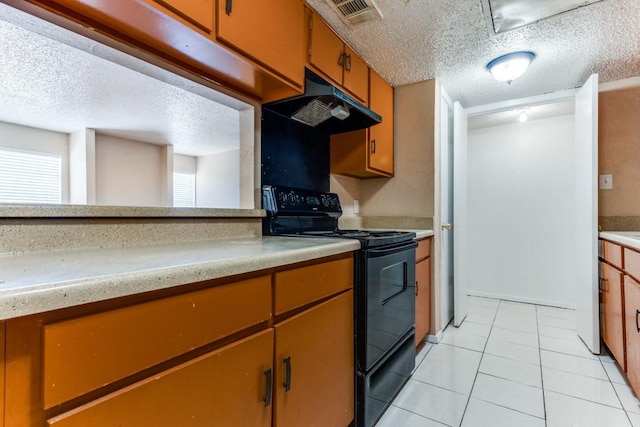 kitchen with light countertops, black range with electric stovetop, visible vents, and a textured ceiling