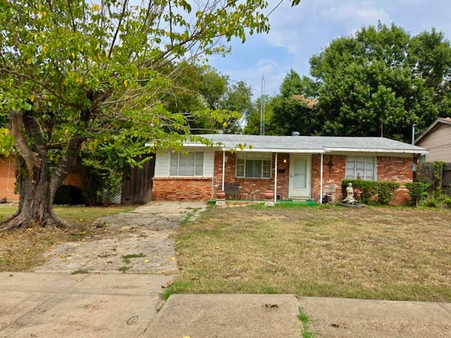 ranch-style house with a front yard